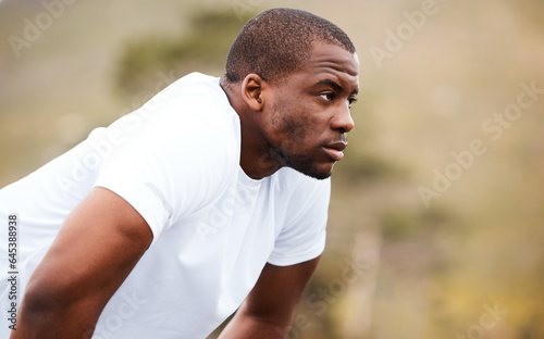 Face, fitness and an exhausted black man runner outdoor for a race, marathon or cardio training. Mindset, exercise and break with a tired young sports person in nature for a workout to improve health