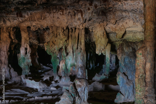 Entrance to Fontein cave, Arikok National Park, Aruba. Stalactites, multi-colored stone formations. 