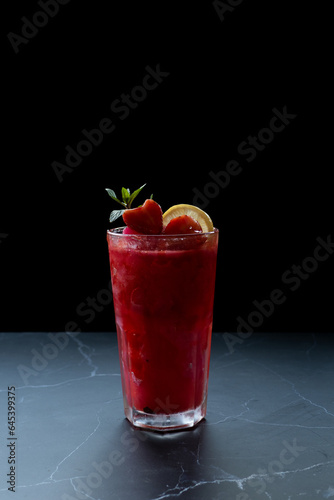 Fruit smoothies  berries  lemon  red  ice crystals  healthy menu  cafe glass black background