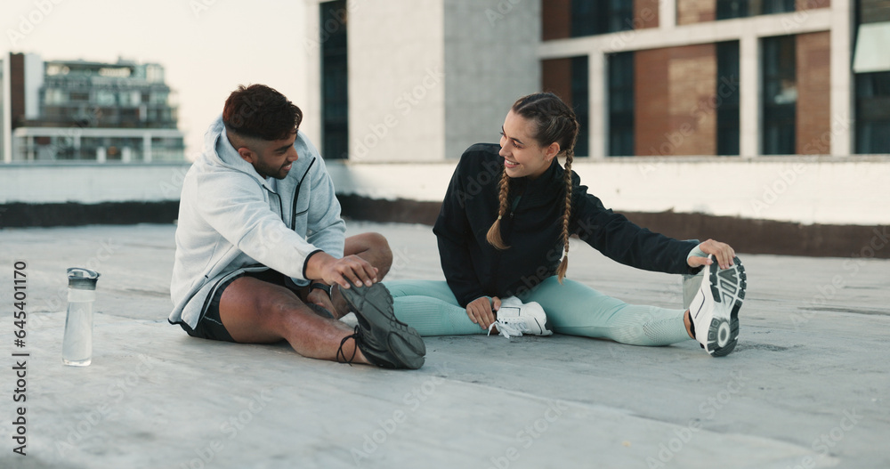 Fitness, couple and stretching body on rooftop in workout, exercise or outdoor training together. Happy man and woman in warm up or getting ready for cardio, practice or sports preparation in city Fitness, couple and stretching body on rooftop in workout, exercise or outdoor training together. Happy man and woman in warm up or getting ready for cardio, practice or sports preparation in city