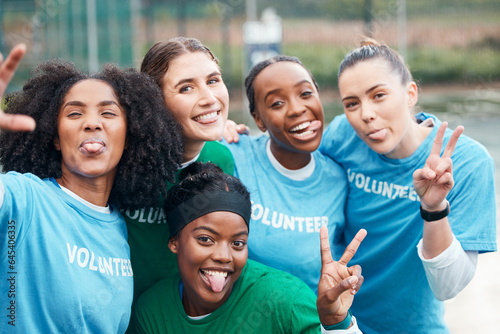 Volunteer, portrait and woman for charity and community support on netball field with diversity and smile. Happiness, people and teamwork for ngo project, solidarity and mission outdoor in nature photo