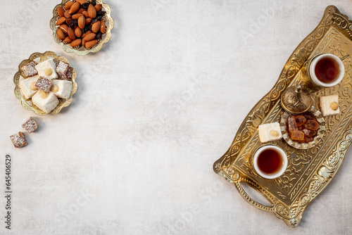 Tea party concept. Traditional Turkish tea with sweets and nuts