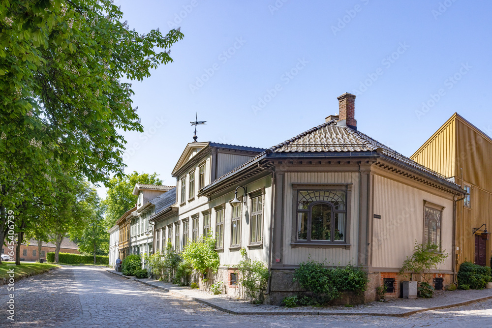 Happy walking in old Fredrikstad on a great warm summer day, with many old buildings, Norway Happy walking in old Fredrikstad on a great warm summer day, with many old buildings, Norway