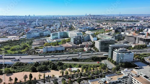Paris: Aerial view of capital city of France, Saint-Denis commune in northern suburbs of Paris - landscape panorama of Europe from above photo