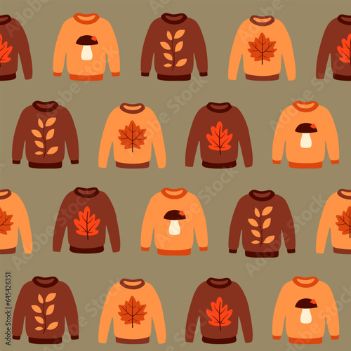 Seamless pattern with cute autumn sweaters. Brown and orange pullovers on grey background. Cartoon flat style. Vector illustration