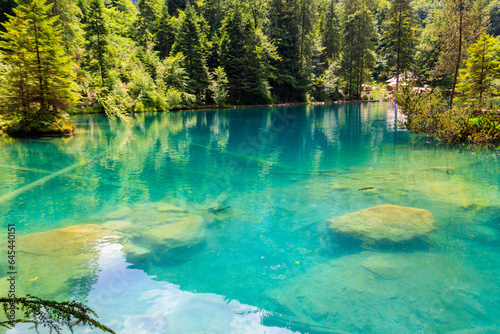Blausee lake or Blue Lake in Bernese Oberland, Kandergrund, Switzerland © olyasolodenko