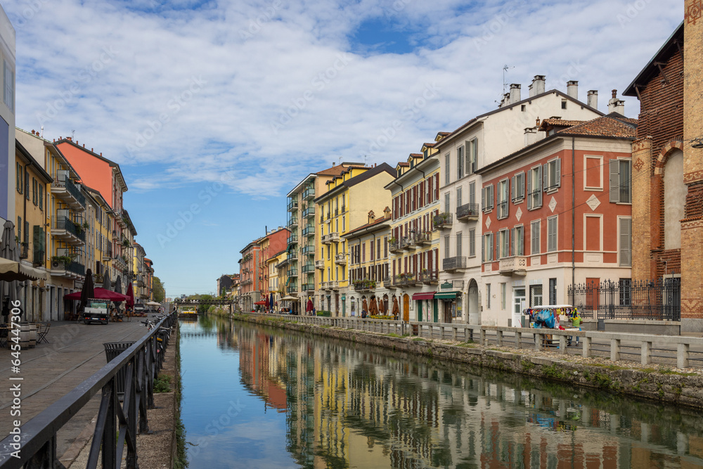 Navigli of Milan, Italy, August 8, 2023; A beautiful sight of houses along the canal of Navigli di Milano