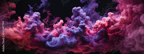 Dense multicolored smoke of red  purple and pink colors on a black isolated background.