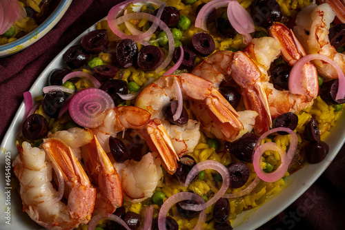 Paella salad--a hot-weather take on a classic rice dish with shrimp, green chilis, tomatoes, and olives.
