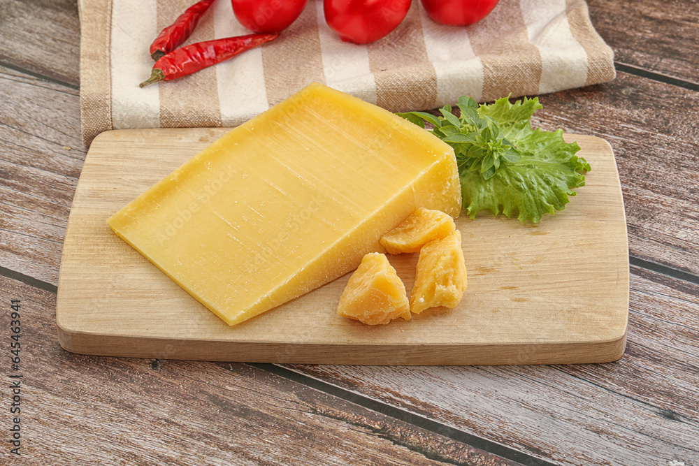 Parmesan hard cheese with small pieces Parmesan hard cheese with small pieces