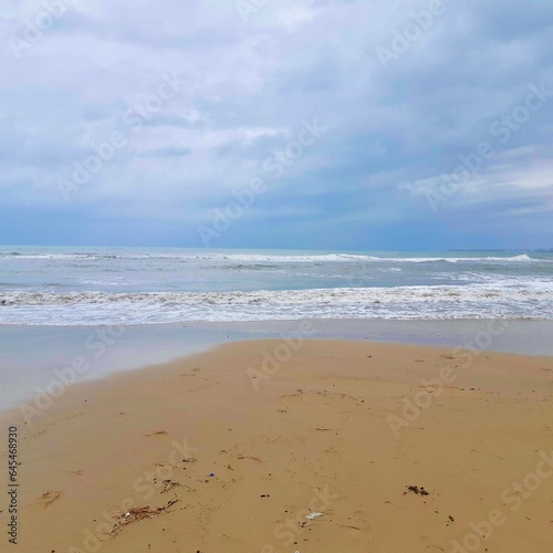   Sea. Sand. Clouds. Rain. Travel. Spain © Ievgeniya
