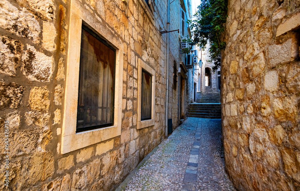 street view of the old town Dubrovnik, Croatia, medieval European architecture, narrow streets in historic city, the concept of traveling through the Balkans