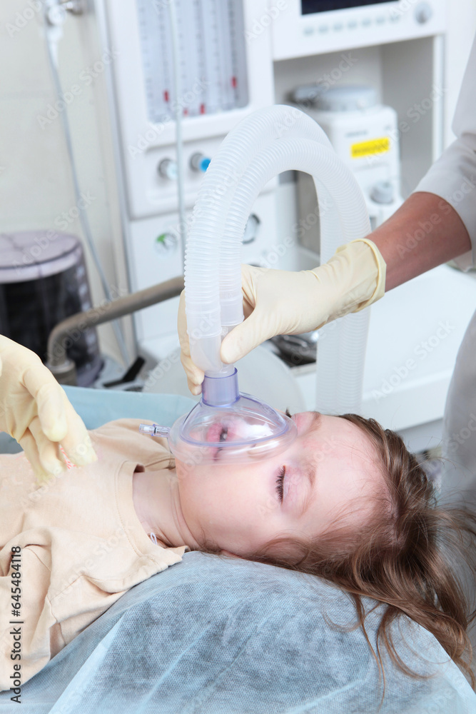 Child is under anesthesia.Small child is undergoing surgery. Concept of health care. Child is under anesthesia.Small child is undergoing surgery. Concept of health care.