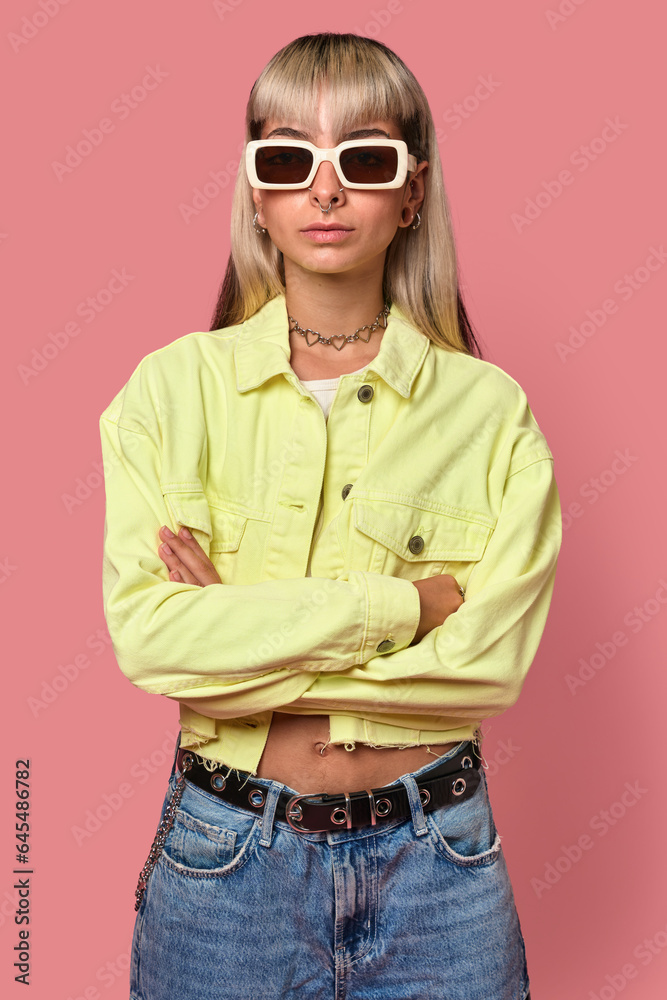 Trendy female model with arms crossed Trendy female model with arms crossed
