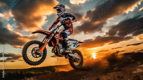 Motocross racer performing on a dirt track. Generative AI © piai