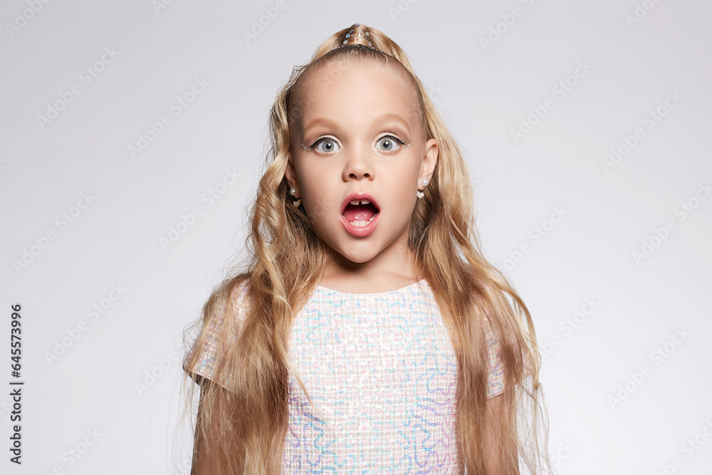 little girl in beautiful dress and make-up. Portrait of funny Child. Blonde - obrazy, fototapety, plakaty 