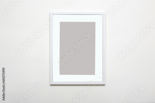 white picture frame. Stylish photoframe with passe-partout for poster or picture
