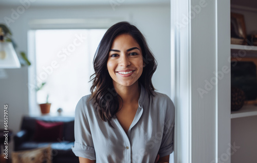 Smiling diverse businesswoman at her home Free Download Smiling diverse businesswoman at her home - GFXLoad