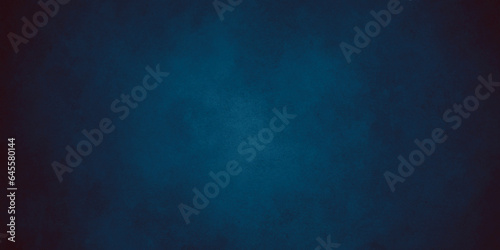 Grunge abstract background. Elegant dark solid blue background with elegant border and rich deep colors with faint vintage texture and light center with blank space