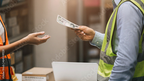 Принти на полотні Closeup worker hand receiving cash money from paying person for salary bonus pay