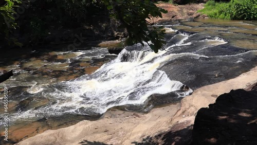 beautiful waterfall in the forest. Huai Chan Waterfall It is a beautiful waterfall in Sisaket Province, Thailand.