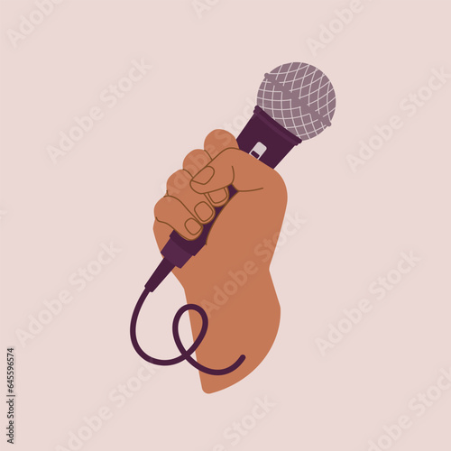 A Person’s Hand Holding A Microphone. Close-Up. Flat Design.