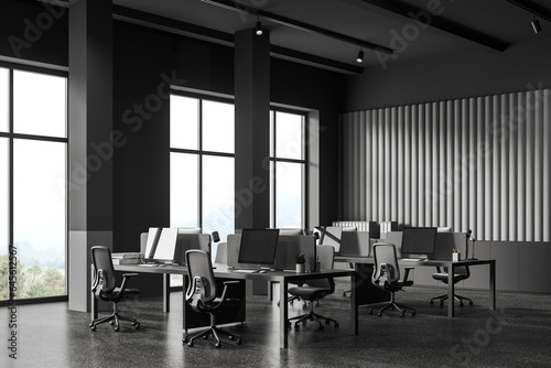 Grey business interior with coworking corner near panoramic window
