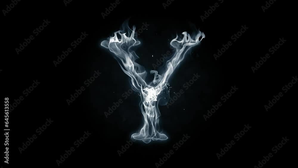 Smoky disappearing letter isolated on black background Smoky disappearing letter isolated on black background