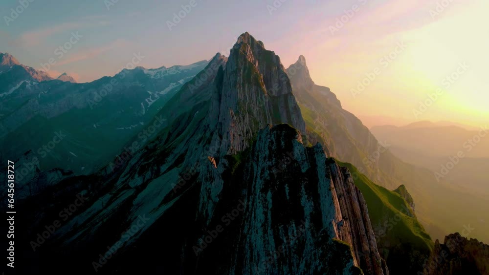 Schaeffler mountain ridge swiss Alpstein, Appenzell Switzerland, a steep ridge of the majestic Schaeffler peak, Switzerland. couple man and woman mid age in the mountains, man and woman hiking