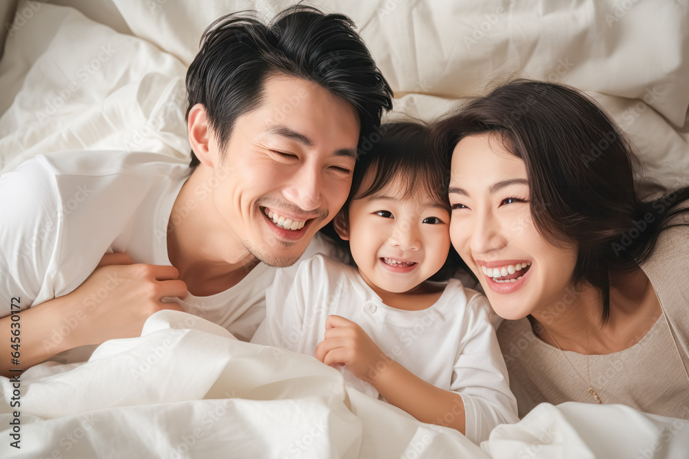 family, mother, father, bed, daughter, home, love, bedroom, happiness, lifestyle. close up to happy family and childhood on bed at home. everyone put on white pajama. everyone smile be honest family, mother, father, bed, daughter, home, love, bedroom, happiness, lifestyle. close up to happy family and childhood on bed at home. everyone put on white pajama. everyone smile be honest