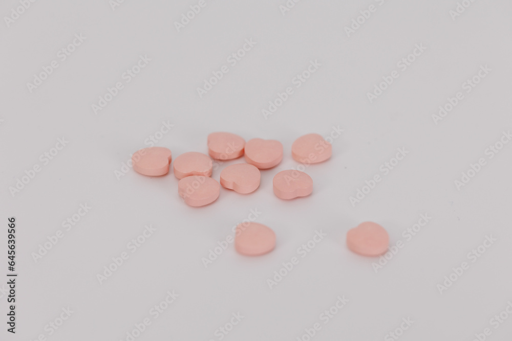 Macro Shot of colour Pills and Capsules During Production and Packing Process on Modern Pharmaceutical Factory. Tablet and Capsule Manufacturing Process. Close-up Shot of Medical Drug Production Line. Macro Shot of colour Pills and Capsules During Production and Packing Process on Modern Pharmaceutical Factory. Tablet and Capsule Manufacturing Process. Close-up Shot of Medical Drug Production Line.