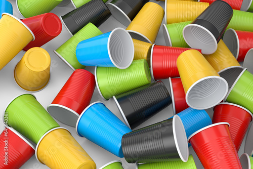 Heap of pastic disposable party cup for juice, fresh, beer on white background.