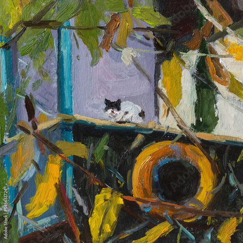 Cat autumn oil painting. A black and white kitten is sitting on the veranda of a house among yellow leaves. The author's original painting. Modern art, impressionism. The concept of relaxation privacy photo