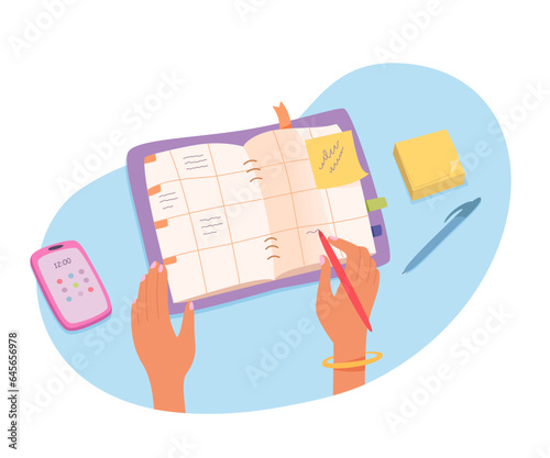 Organize tasks with calendar planner, female hand holding pen to write in notebook