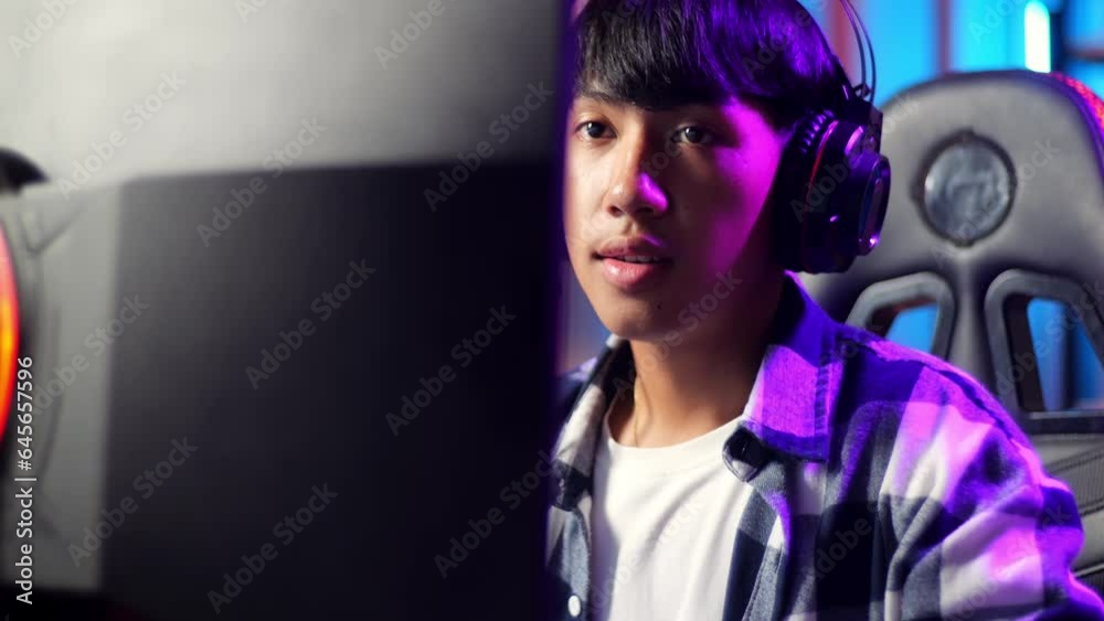 Close Up Of Excited Asian Teen Boy Gamer Playing Video Game On Computer
Close Up Of Excited Asian Teen Boy Gamer Playing Video Game On Computer