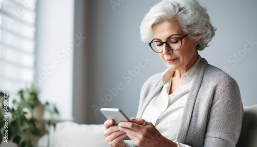 Elderly woman chooses products on her phone for Black Friday