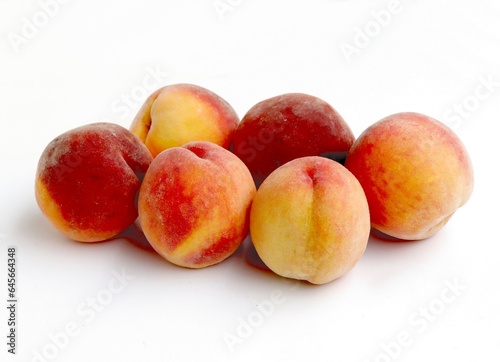 red and golden,sweet peaches as delicious fruit