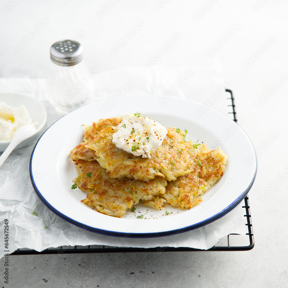 Homemade potato latkes with cream cheese