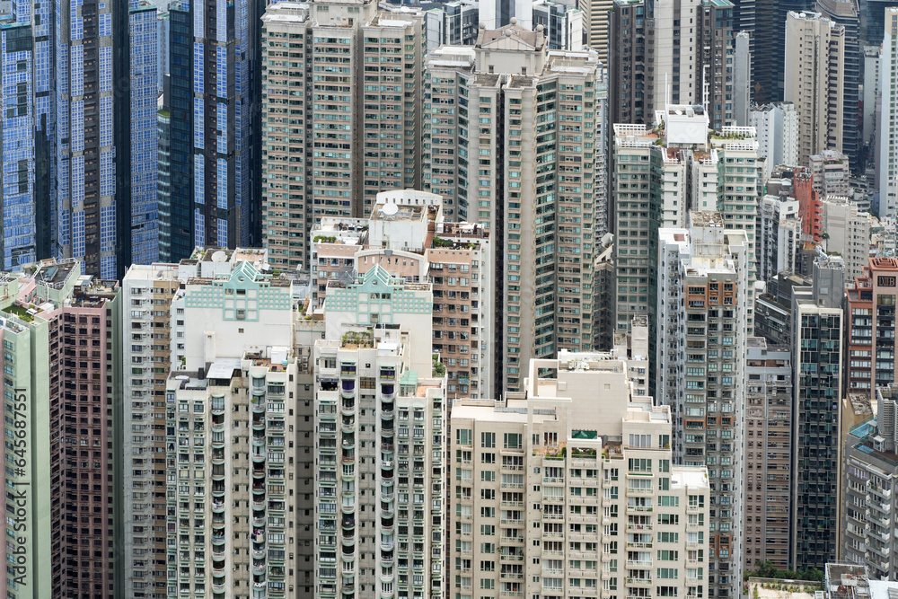 Fototapeta High rise apartment buildings in Hong Kong densely packed together 