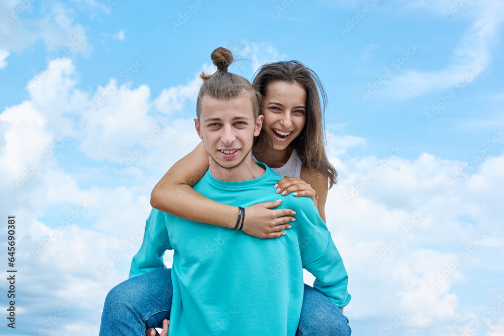 Happy cheerful teenage friends having fun together on beach. Happy cheerful teenage friends having fun together on beach.