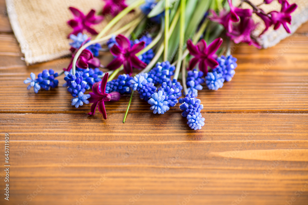 beautiful bouquet of spring flowers on a wooden table
