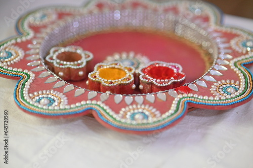 haldi kumkum ceremony beautiful plate. Red and yellow powder. Beautiful decoration plate. Pooja plate. Hinduism. Maharashtra culture