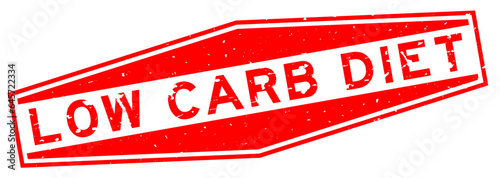 Grunge red low carb diet word hexagon rubber seal stamp on white background