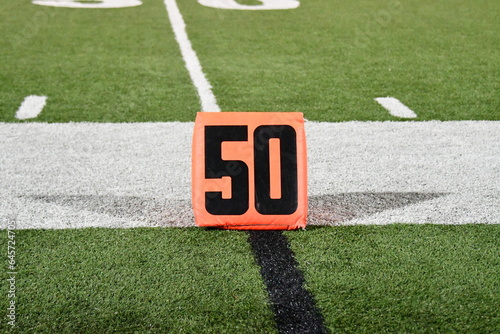 Tablou pe pânză Fifty-Yard Line Marker on a Football Field