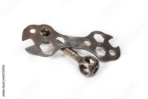 dumbbell spanner and vintage  dogbone wrenches for hexagonal head cap  Bike screws, soft focus close up photo