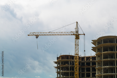 Construction of a multi-storey building by a tower crane