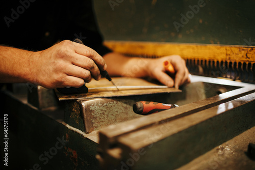 Middle aged man working in a workshop