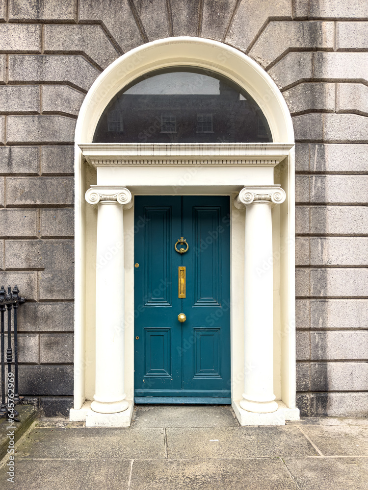 A famous blue green painted Georgian door in Dublin, Ireland A famous blue green painted Georgian door in Dublin, Ireland