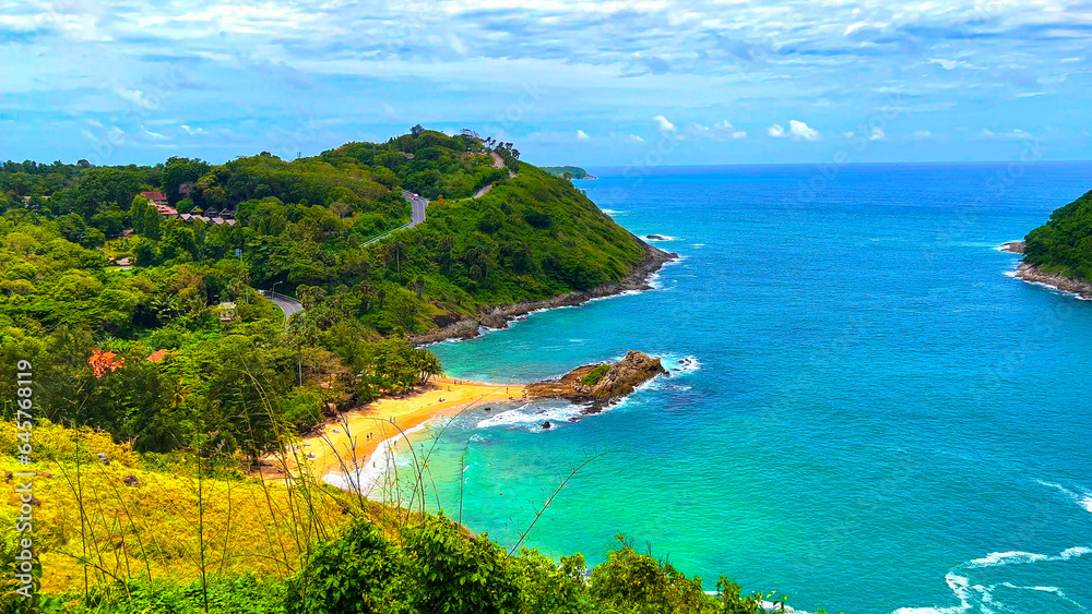 Ya Nui Beach and Nai Harn Beach in Phuket Thailand, turquoise blue waters, lush green mountains colourful skies. Phuket is a tropical island many palms teaming with wildlife and sea fisheries 