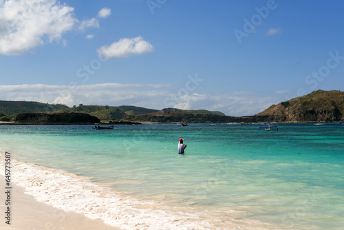 Canvas Print fishing on the beach, fisherman on the beach, traditional angler, local resident
